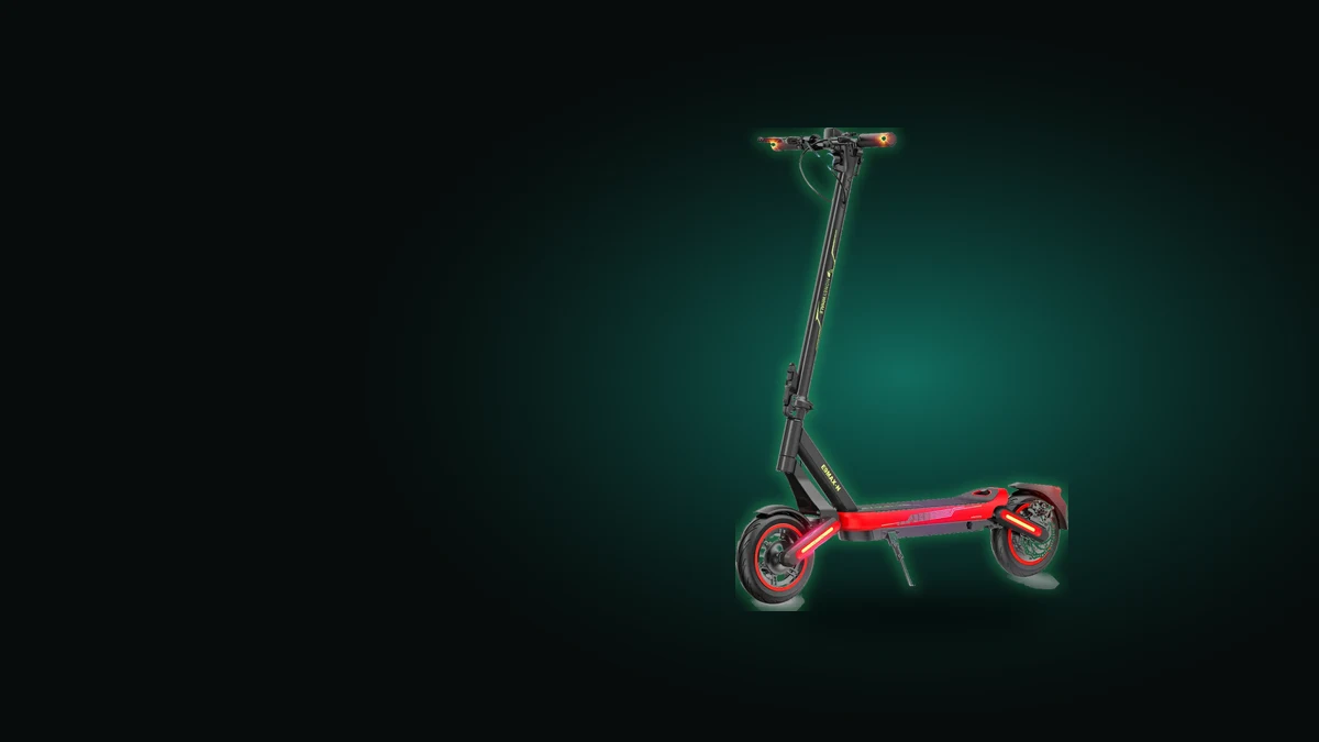 Patinete elétrico adulto Honeywhale E9 MAX-N preto e vermelho sobre fundo verde escuro